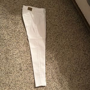 American Eagle white skinny jeans.